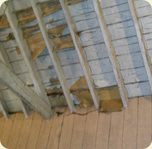 Roof tiles slipped or missing meant rainwater ingress through the ceiling